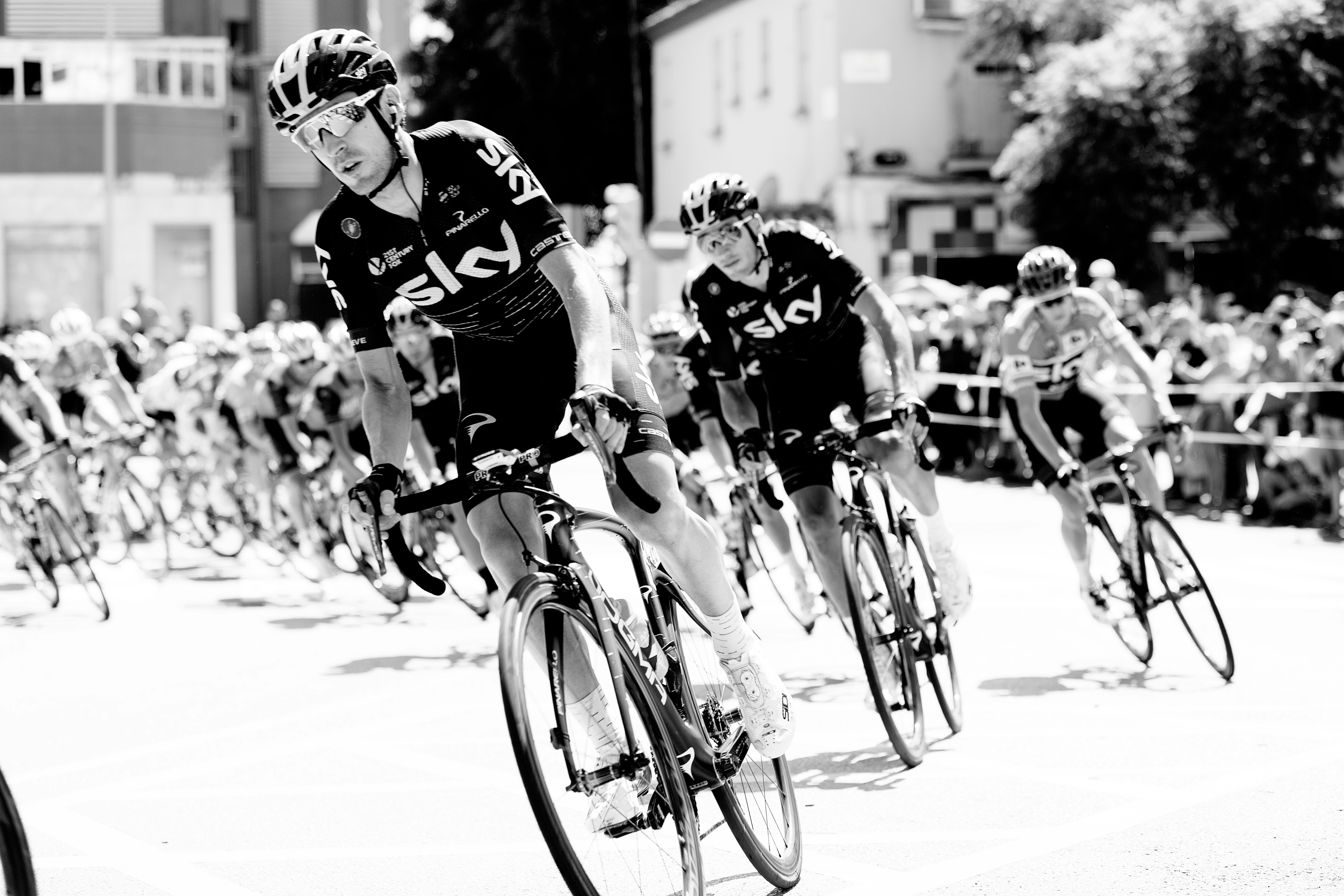 grayscale photo of cyclist